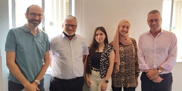 Prof . Bernard With The College Staff